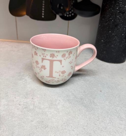  — Letter T mug , pink coloured