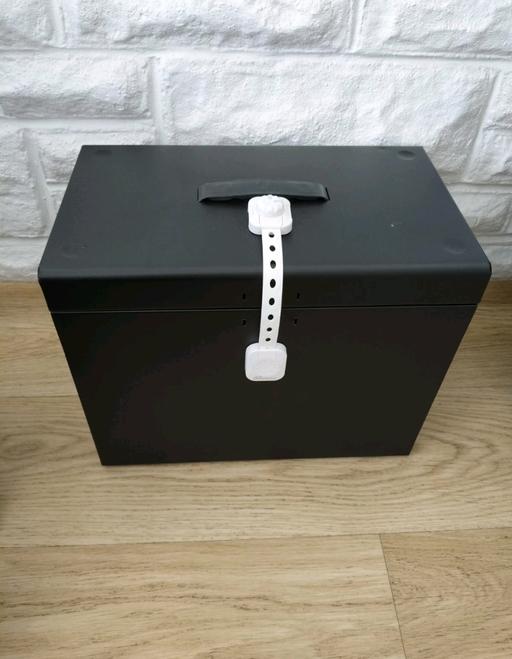  — Black Metal File Box Used In Good Condition.