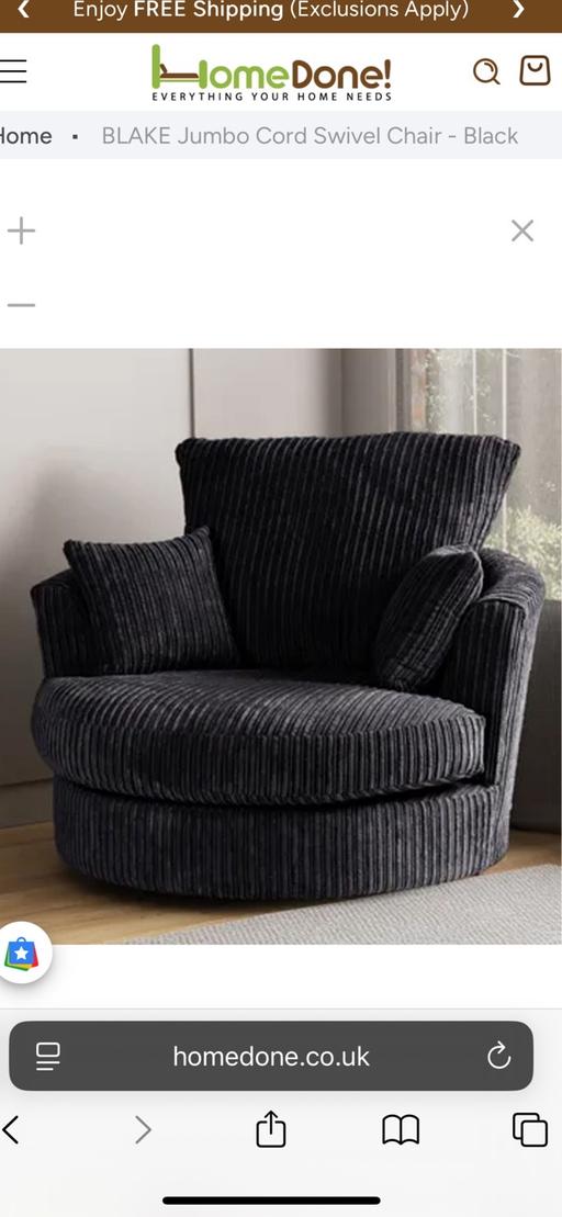  — Black corduroy swivel chair