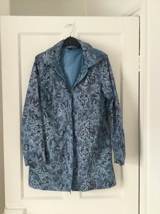  — Rain coat size 10