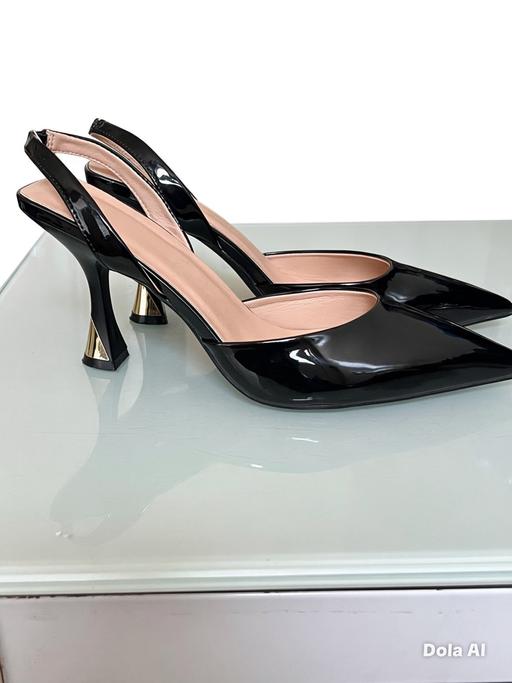  — Shoe