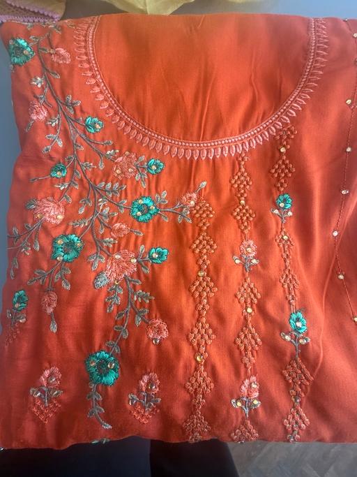  — Unstitched suit
