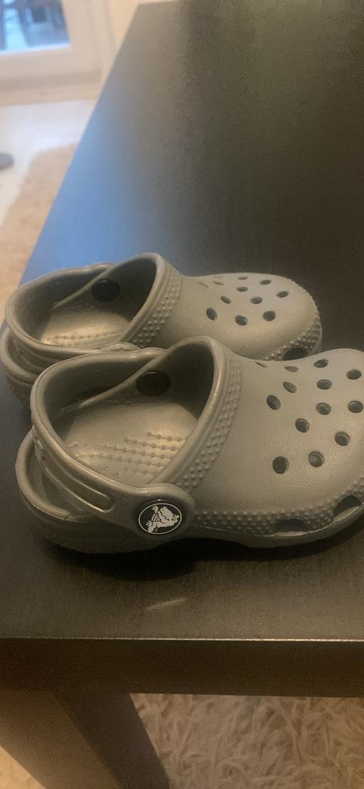  — Grey baby crocs