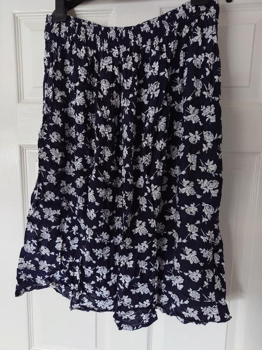  — Women's navy flower skirt size one size