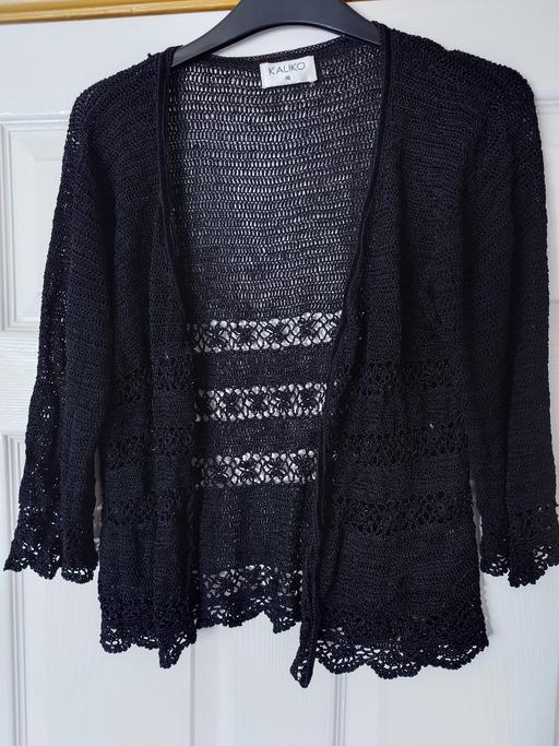  — Women's black lace cardi size 16