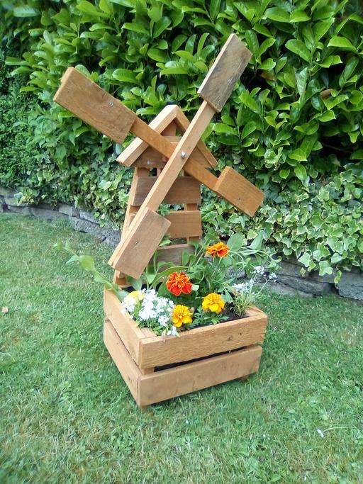  — windmill planter