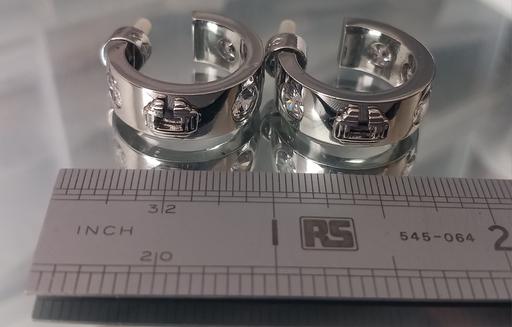  — Carvela Signature Hoop Silver Earrings