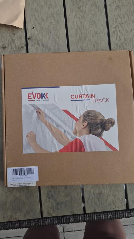  — curtains rack