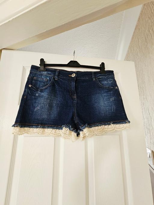  — Next distressed style shorts, size 16.