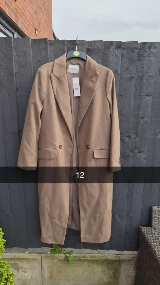  — coat
