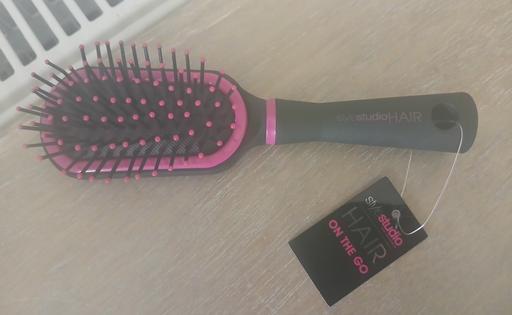  — Hairbrush)