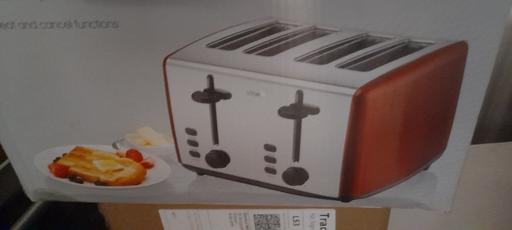  — logic wide 4 slice toaster.red/silver
