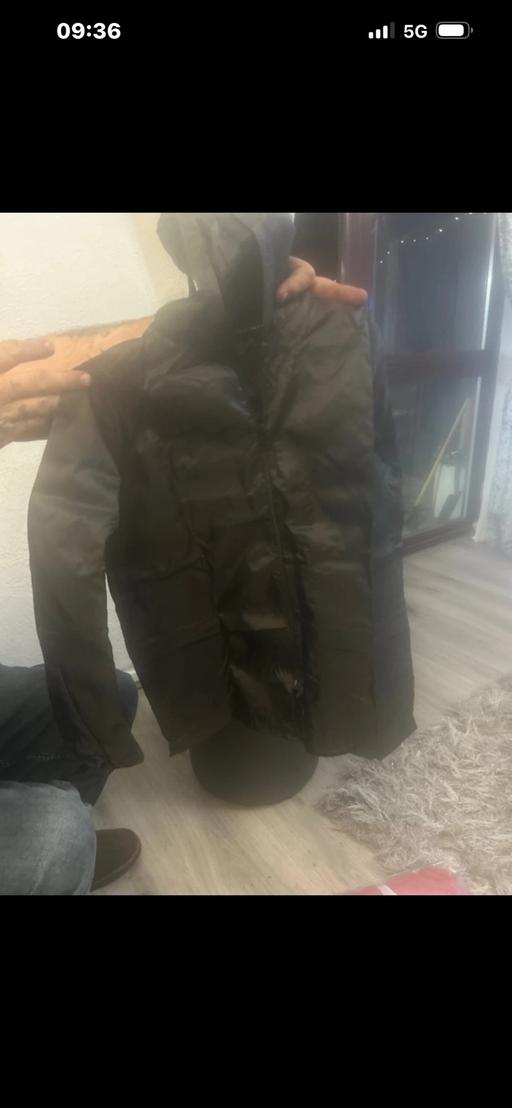  — Kids water proof rain Mac in a bag