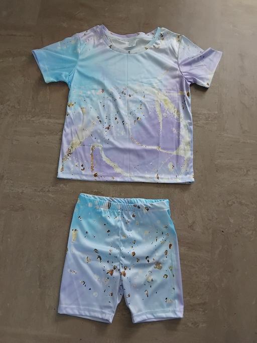  — New Shorts/Top.