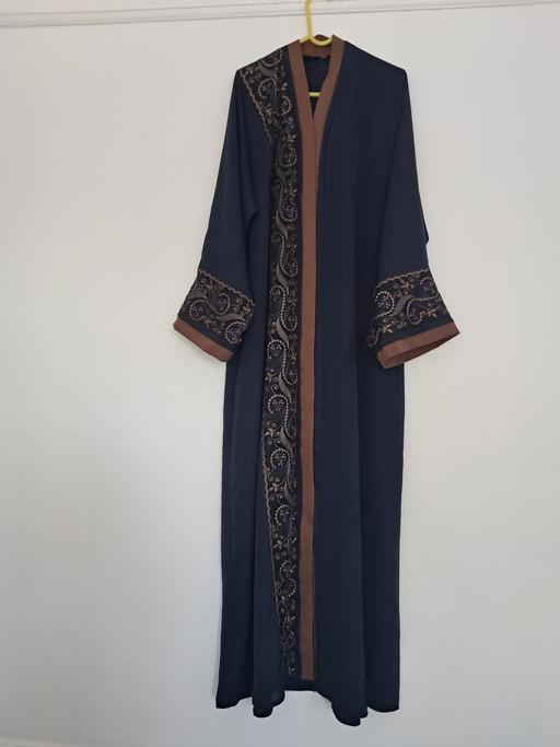  — LONG ABAYA