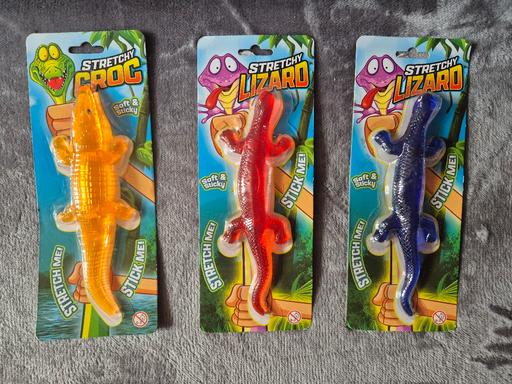  — new Stretchy Lizard/Croc 80p EACH