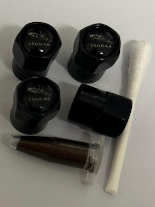  — Jaguar Tyre valve caps with grease 