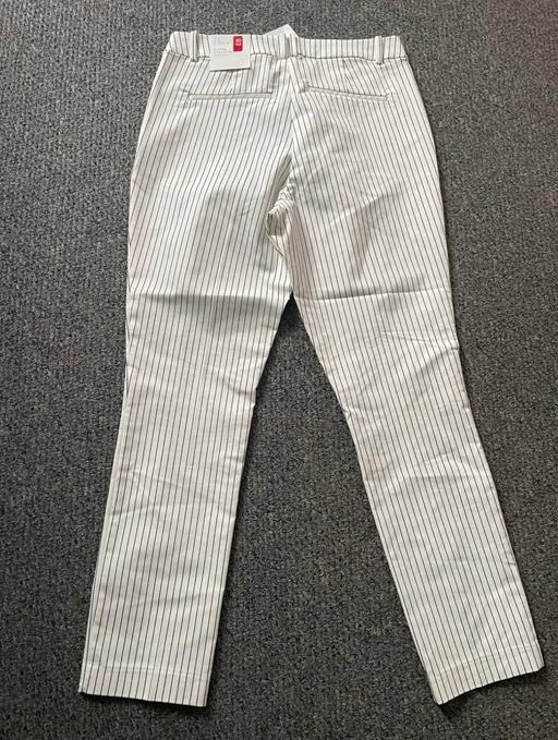  — H&M white pinstripe trousers size 16