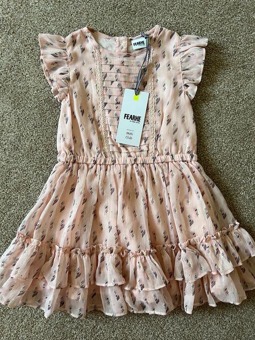  — Brand new dress 1-1.5years