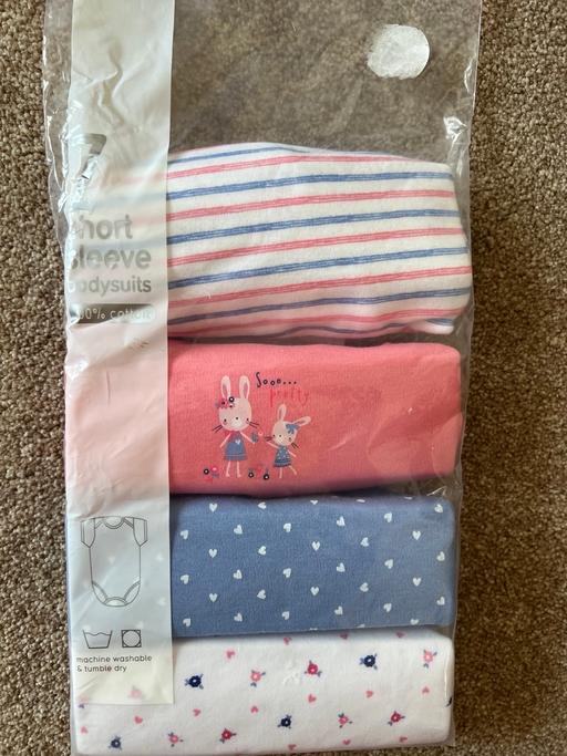  — Brand New Short sleeve body suits 9-12months