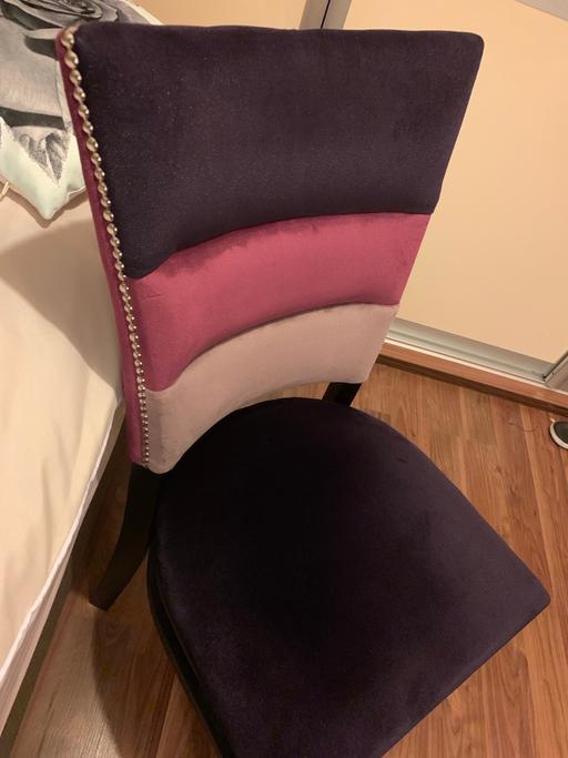  — Purple pink beige grey white cushioned chair