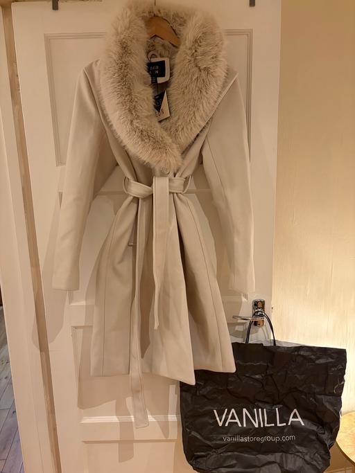  — Fur coat