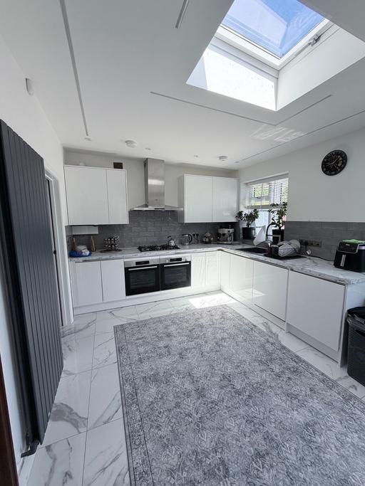  — Kitchen Fitter