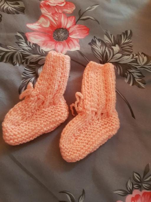  — hand knitted baby booties