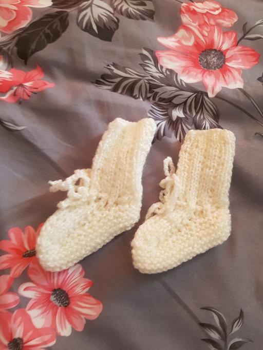  — hand knitted baby booties
