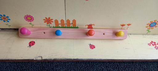  — Ikea Flisat knob rack with 4 colourful knobs