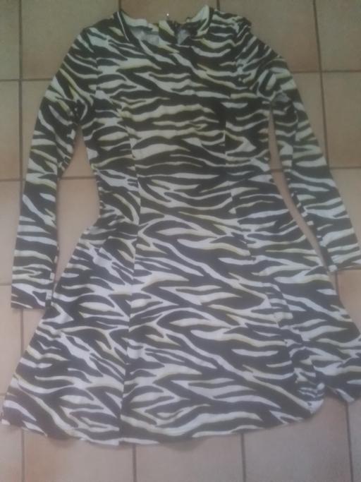  — NEW LOOK DRESS