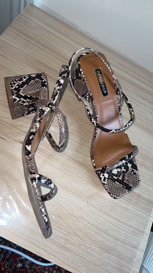  — Snake print block sandals