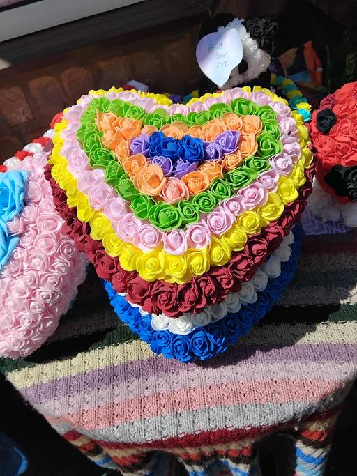  — rainbow rise covered heart