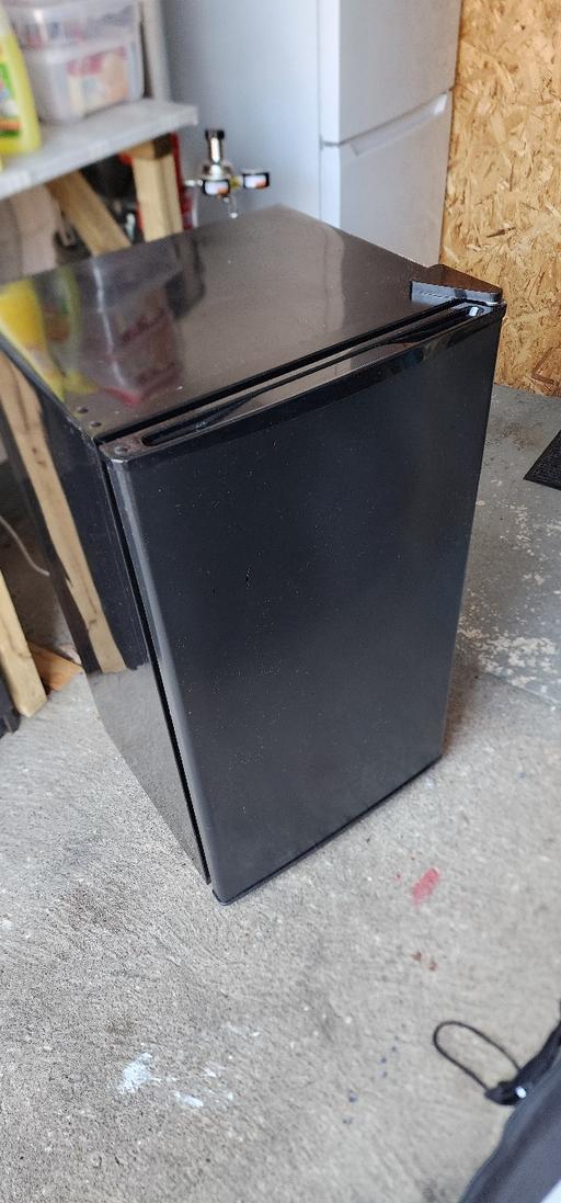  — freestanding black fridge