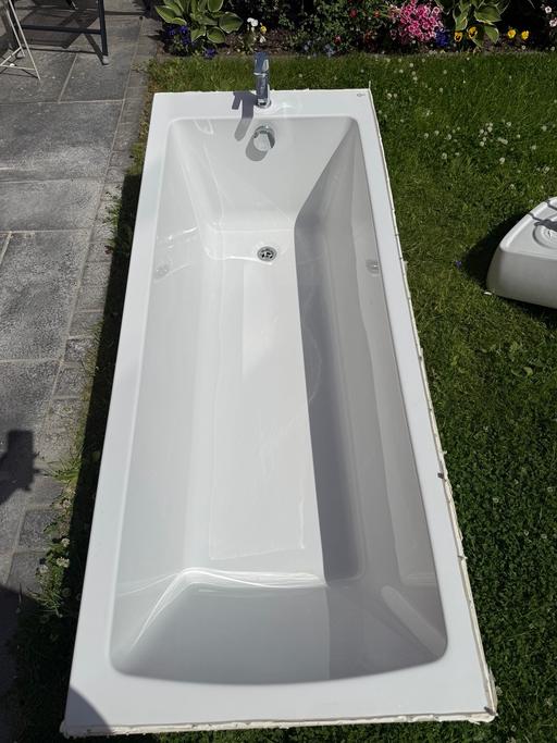  — Bath and mixer tap