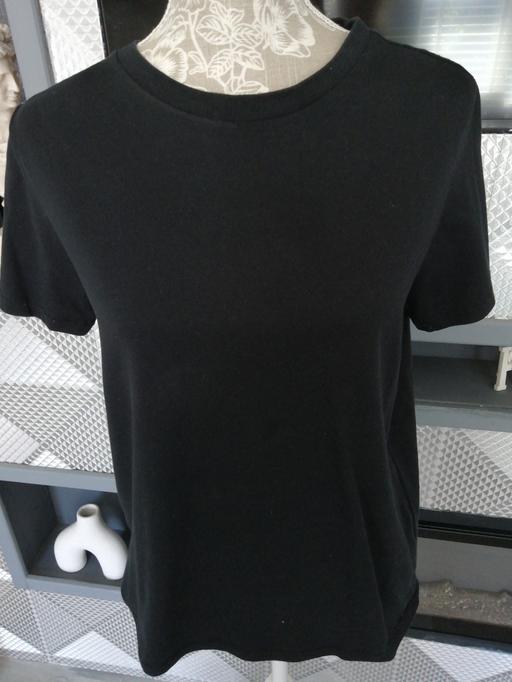  — ladies size *M* small spec bleach mark