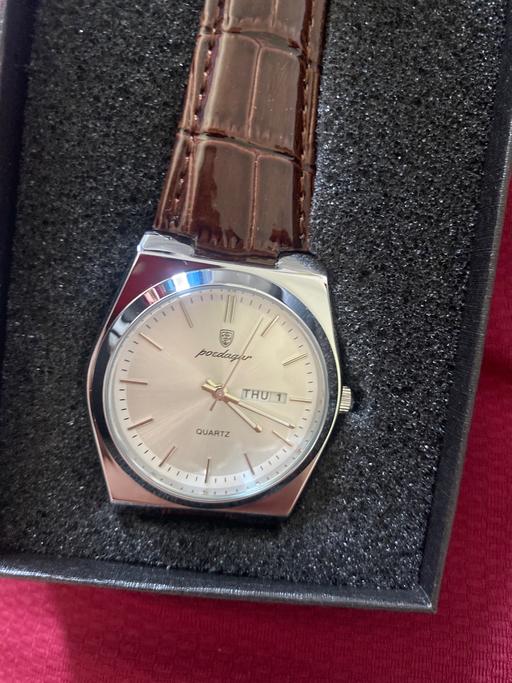  — Watch