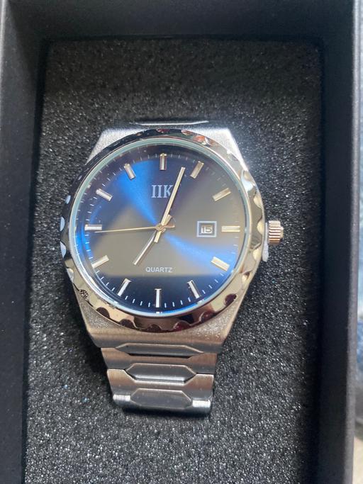  — IIK watch