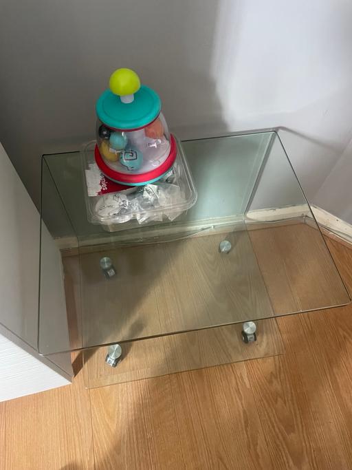  — 2X.  Glass side tables