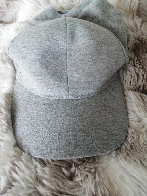  — Cap
