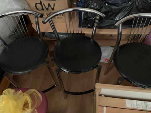  — Three black leather metal bar kitchen stools