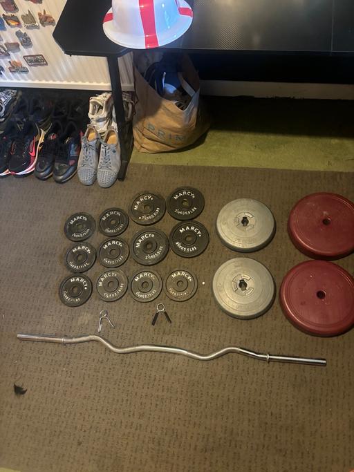  — Weights and curling bar