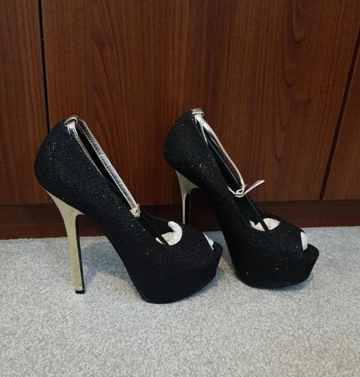  — Black sparkly heels