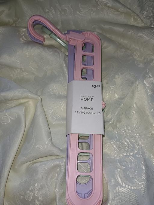  — Space saving hangers