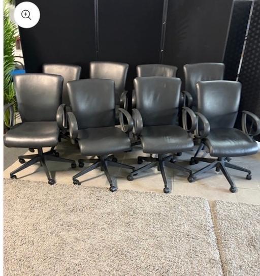  — Black leather meeting executive chair