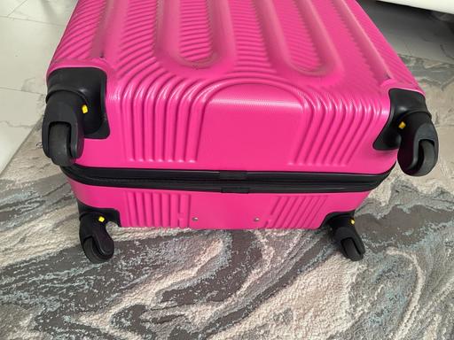  — Pink luggage 4 wheel