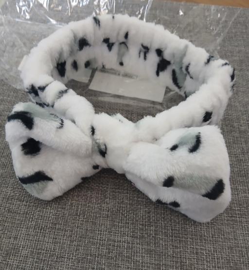  — Head Band New