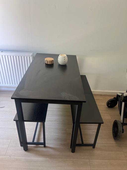  — Dining set table and benches