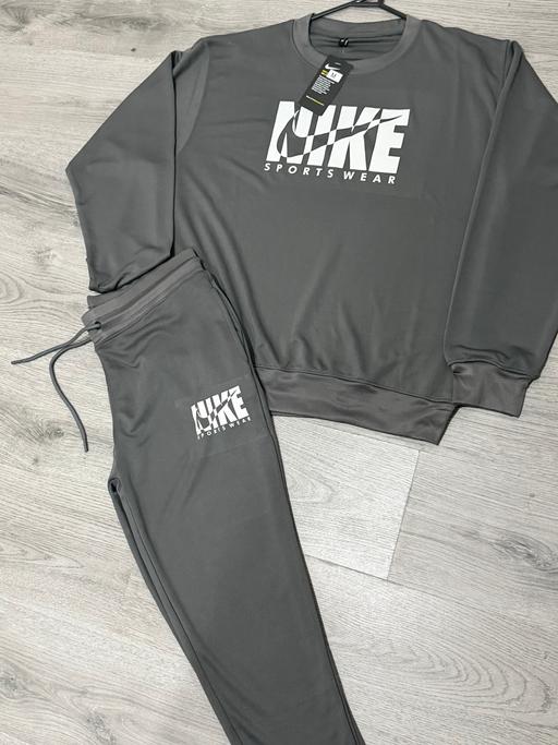  — Grey Nike tracksuit