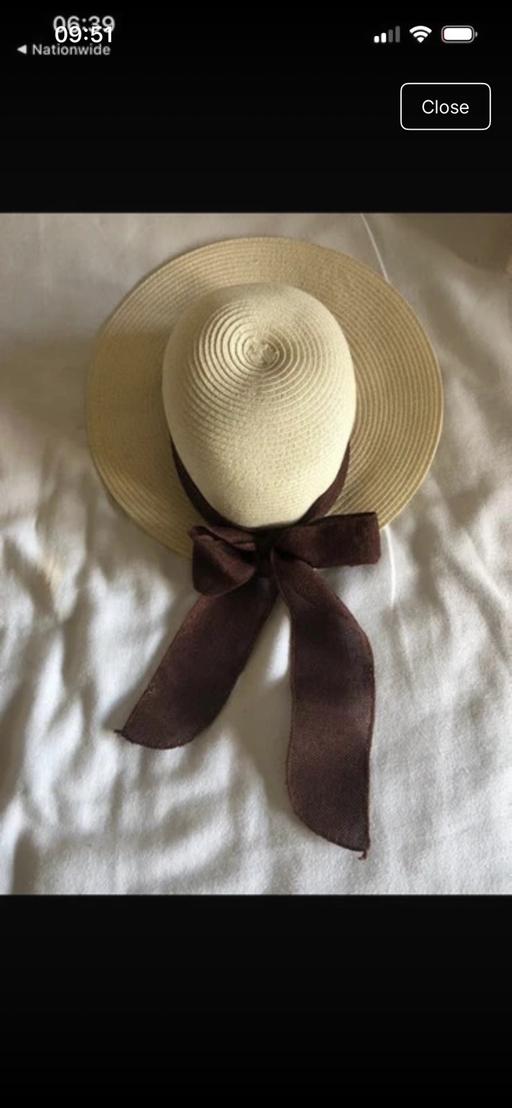  — Summer hat with brown bow beach holiday women